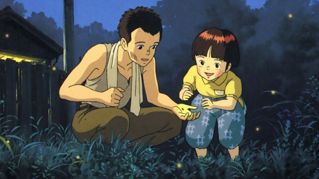 Seita and his sister Setsuko looking excitedly at fireflies together.